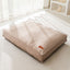 Cozy all-season waterproof mattress dog bed in a sunny room, perfect for pampering your furry friend.